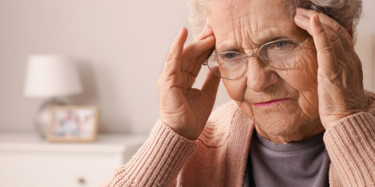 Elderly Woman Experiencing Cognitive Discomfort at Memory Care Facility